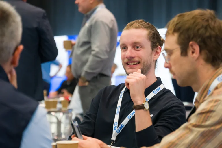 Delegates networking at a cafe table at the 2026 Sustainable Food Factory and Food+Beverage Engineering event.