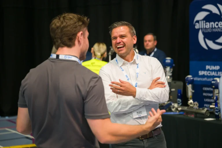 Delegates networking beside an exhibition stand at the 2026 Sustainable Food Factory and Food+Beverage Engineering event.