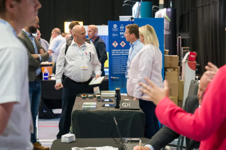 Exhibitors demonstrating equipment to visitors at the 2026 Sustainable Food Factory and Food+Beverage Engineering event.