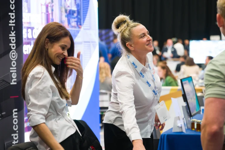 Exhibitors greeting visitors at their stand at the 2026 Sustainable Food Factory and Food+Beverage Engineering event.