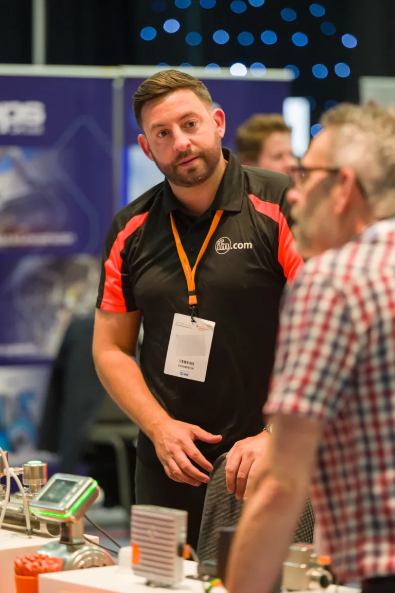Visitor talking with an exhibitor at the 2026 Sustainable Food Factory and Food+Beverage Engineering event.
